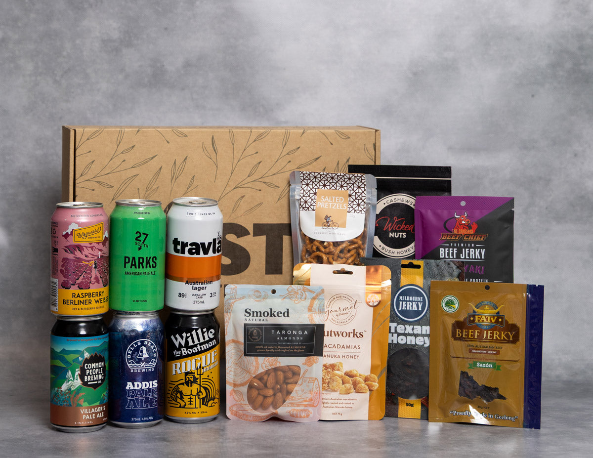 Beer, Jerky and Nuts Hamper. Assorted canned drinks and packaged snacks displayed in front of a cardboard box with Taste Australia branding.